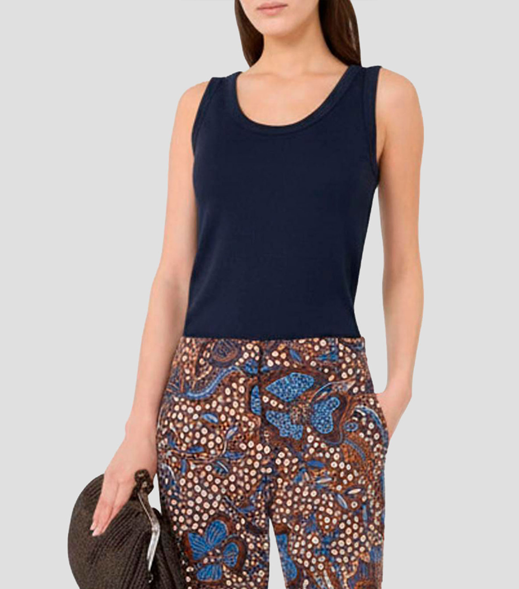 Blusa lisa sin mangas Mujer